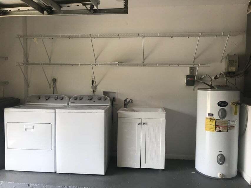 7735 Kenway Place East Boca Raton, FL 33433 - Photo 19 of 19 laundry in garage