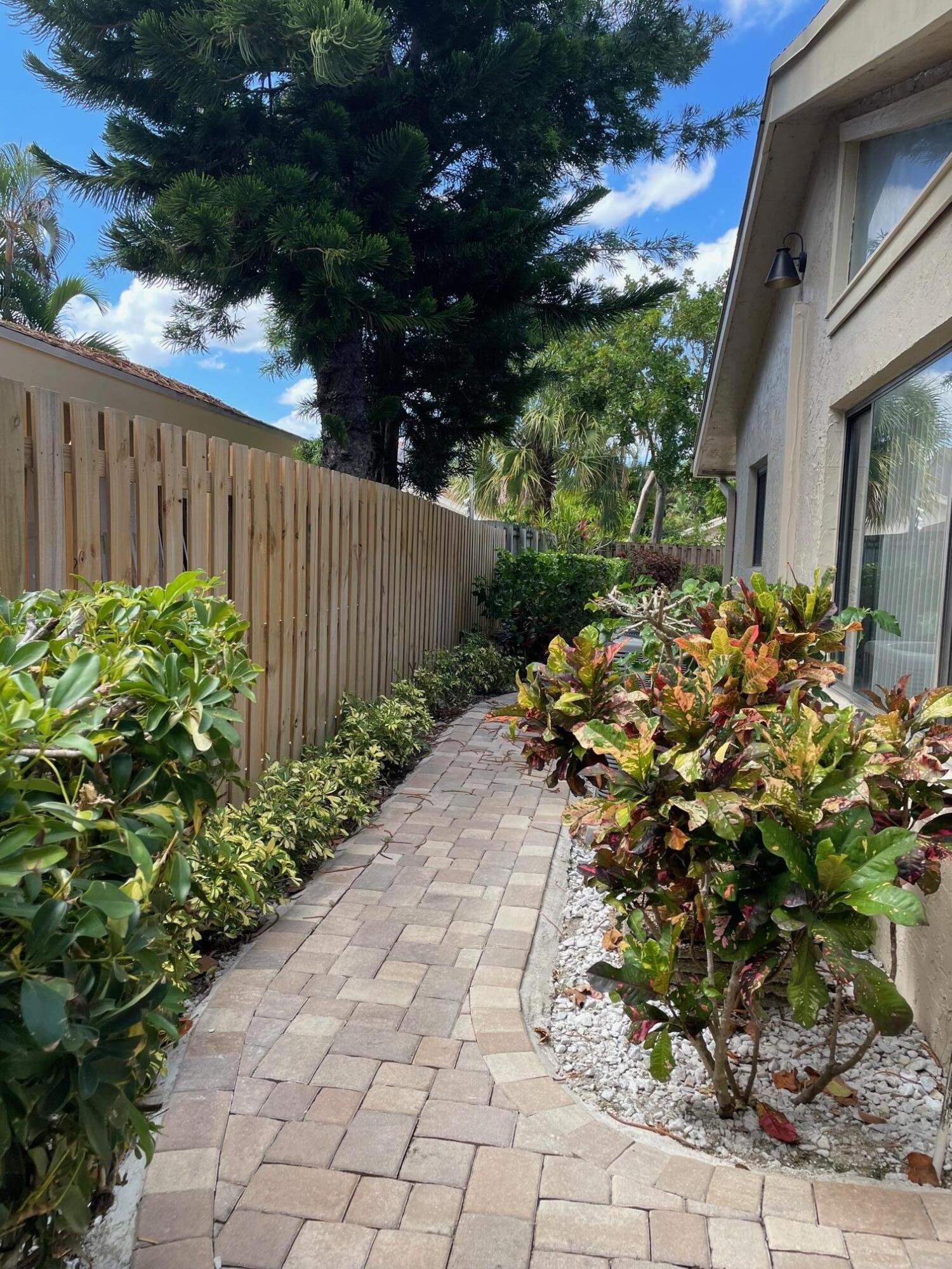 7735 Kenway Place East Boca Raton, FL 33433 - Photo 3 of 19 side