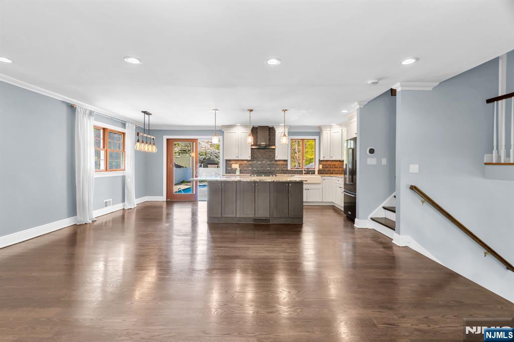 53 Smithfield Road Waldwick, NJ 07463 - Photo 17 of 48 a large kitchen with stainless steel appliances granite countertop a large counter top a sink and a refrigerator