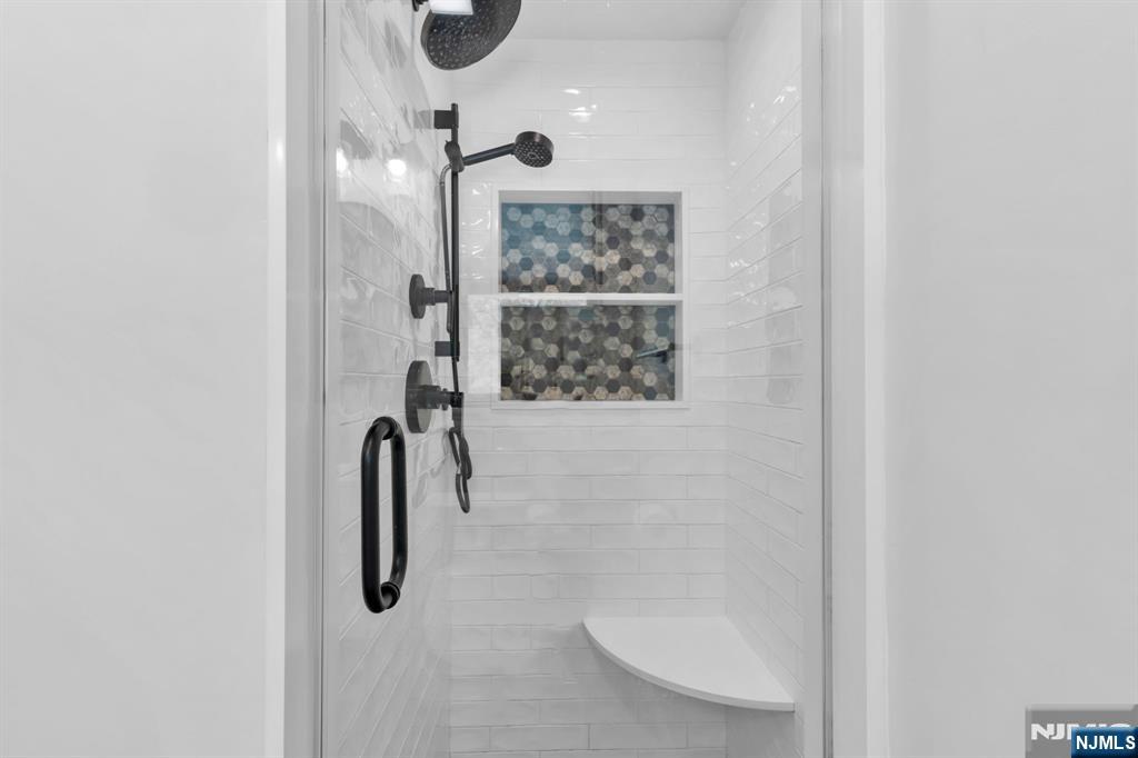 53 Smithfield Road Waldwick, NJ 07463 - Photo 32 of 48 a bathroom with a shower