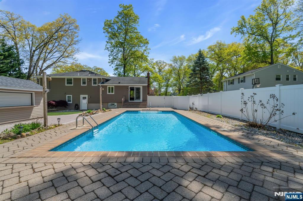 53 Smithfield Road Waldwick, NJ 07463 - Photo 36 of 48 a view of a house with a swimming pool