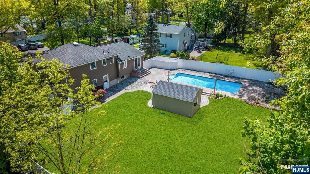 53 Smithfield Road Waldwick, NJ 07463 - Photo 41 of 48 an aerial view of a house with swimming pool garden and patio