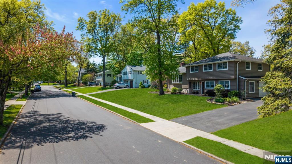 53 Smithfield Road Waldwick, NJ 07463 - Photo 44 of 48 a front view of a house with a yard
