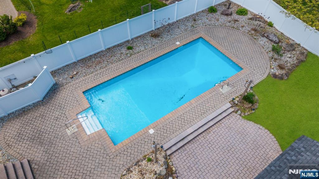 53 Smithfield Road Waldwick, NJ 07463 - Photo 47 of 48 a view of a backyard with plants and lake view