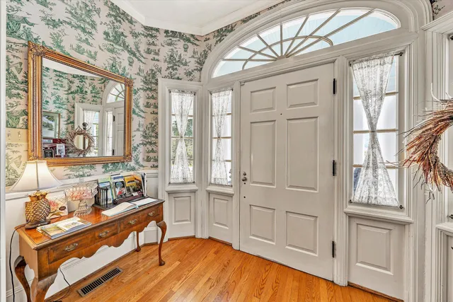 a kitchen with stainless steel appliances granite countertop a sink and cabinets
