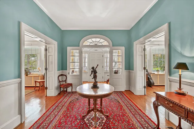 a kitchen with stainless steel appliances granite countertop a stove and cabinets