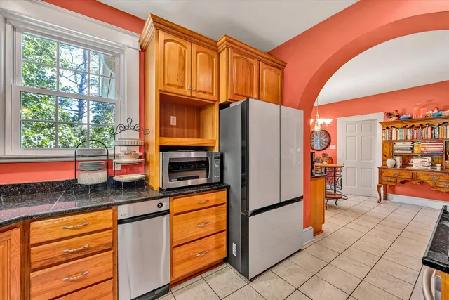a bathroom with a sink and a window