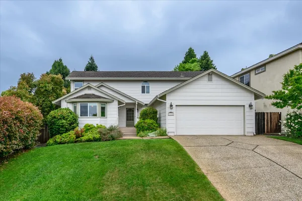 front view of house with a yard