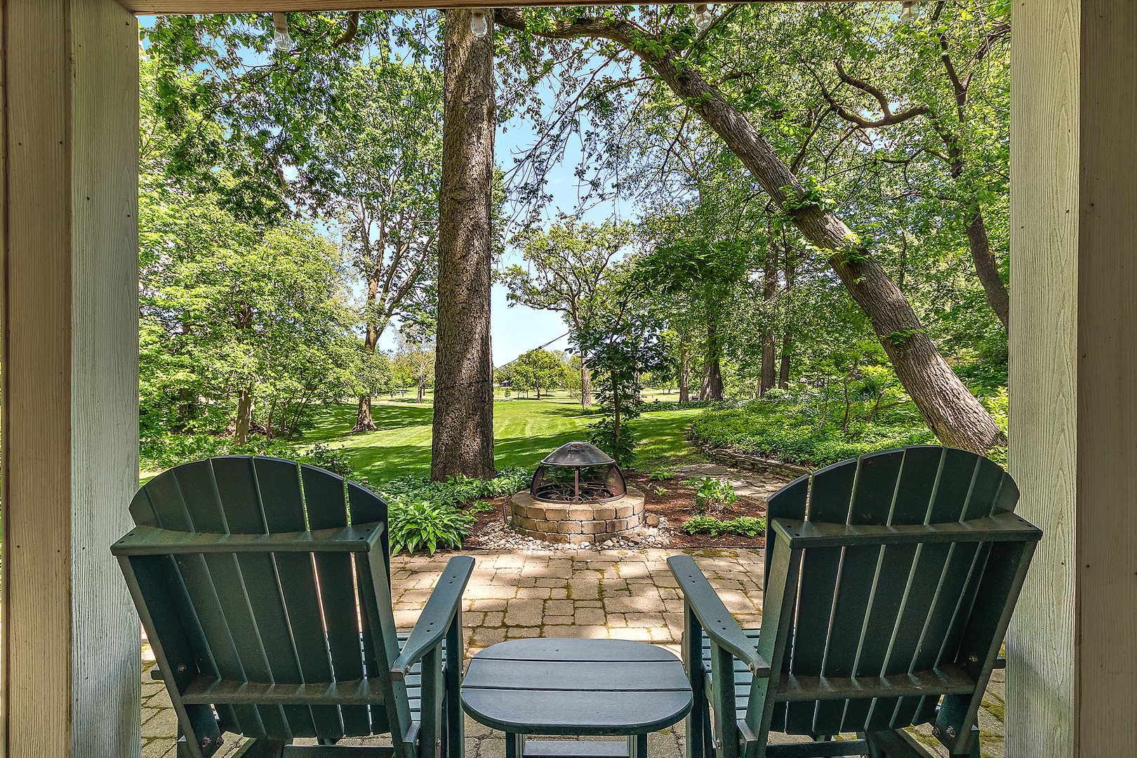 581 Aberdeen Road Frankfort, IL 60423 - Photo 2 of 65 a view of table and chair under an umbrella