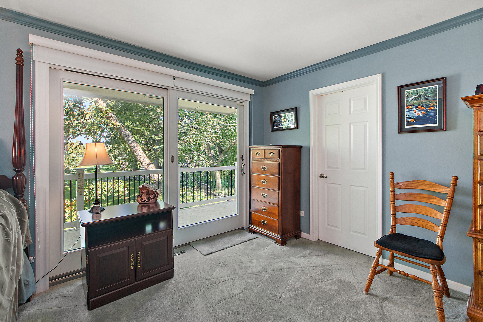 581 Aberdeen Road Frankfort, IL 60423 - Photo 23 of 65 a living room with furniture and a floor to ceiling window