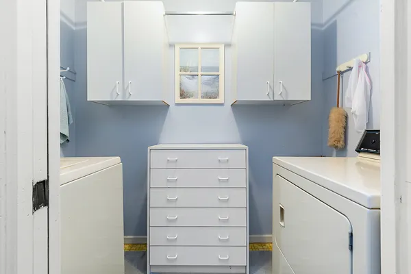 front view of a house with a garden