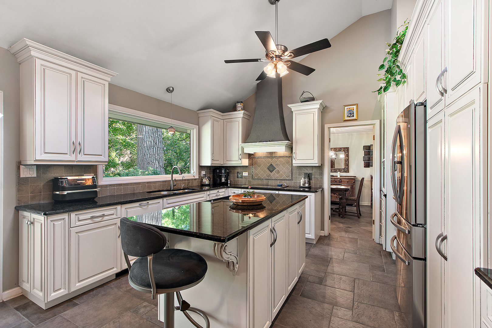 581 Aberdeen Road Frankfort, IL 60423 - Photo 6 of 65 a kitchen with stainless steel appliances granite countertop a sink a stove and a refrigerator