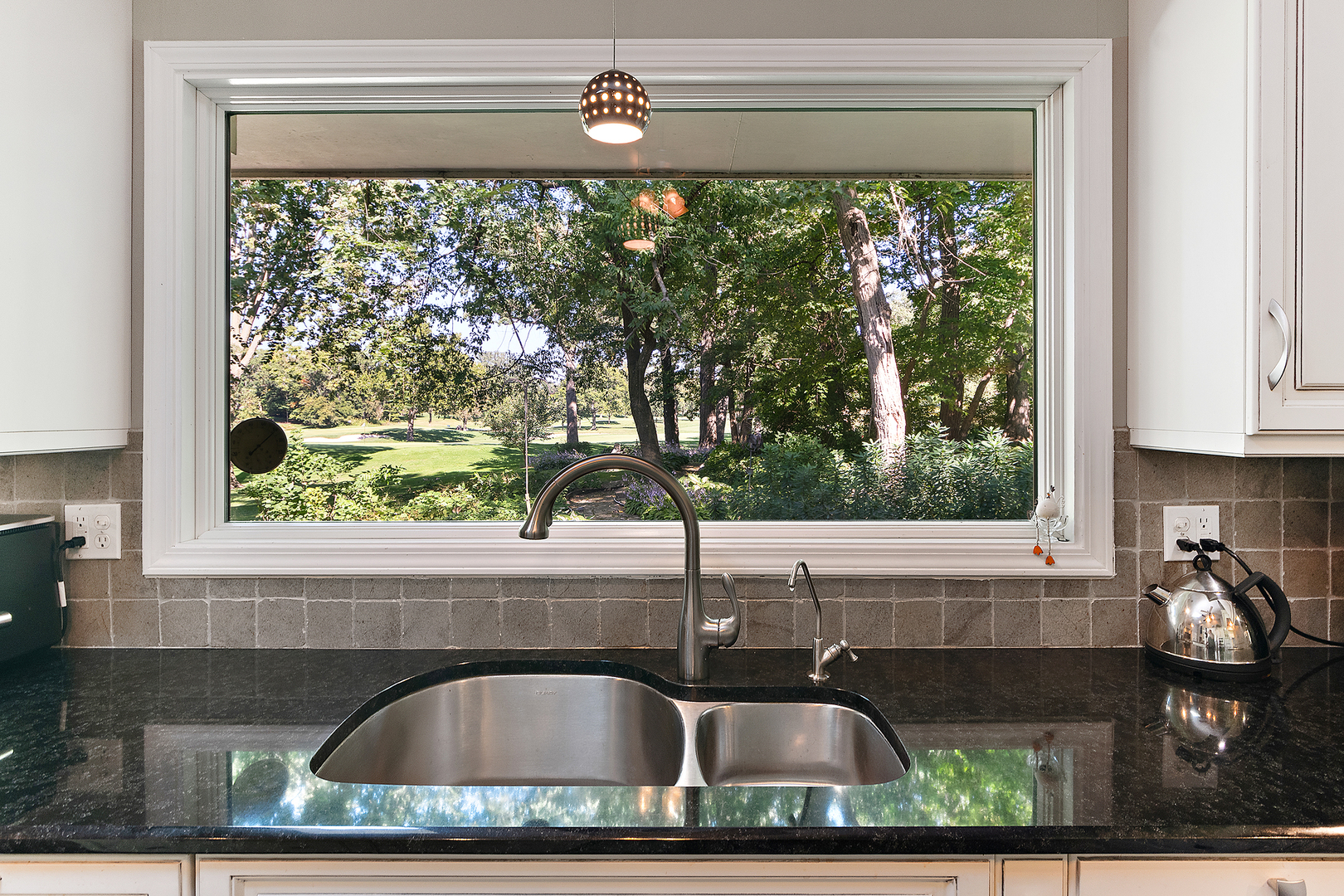 581 Aberdeen Road Frankfort, IL 60423 - Photo 8 of 65 a kitchen sink sitting next to a window