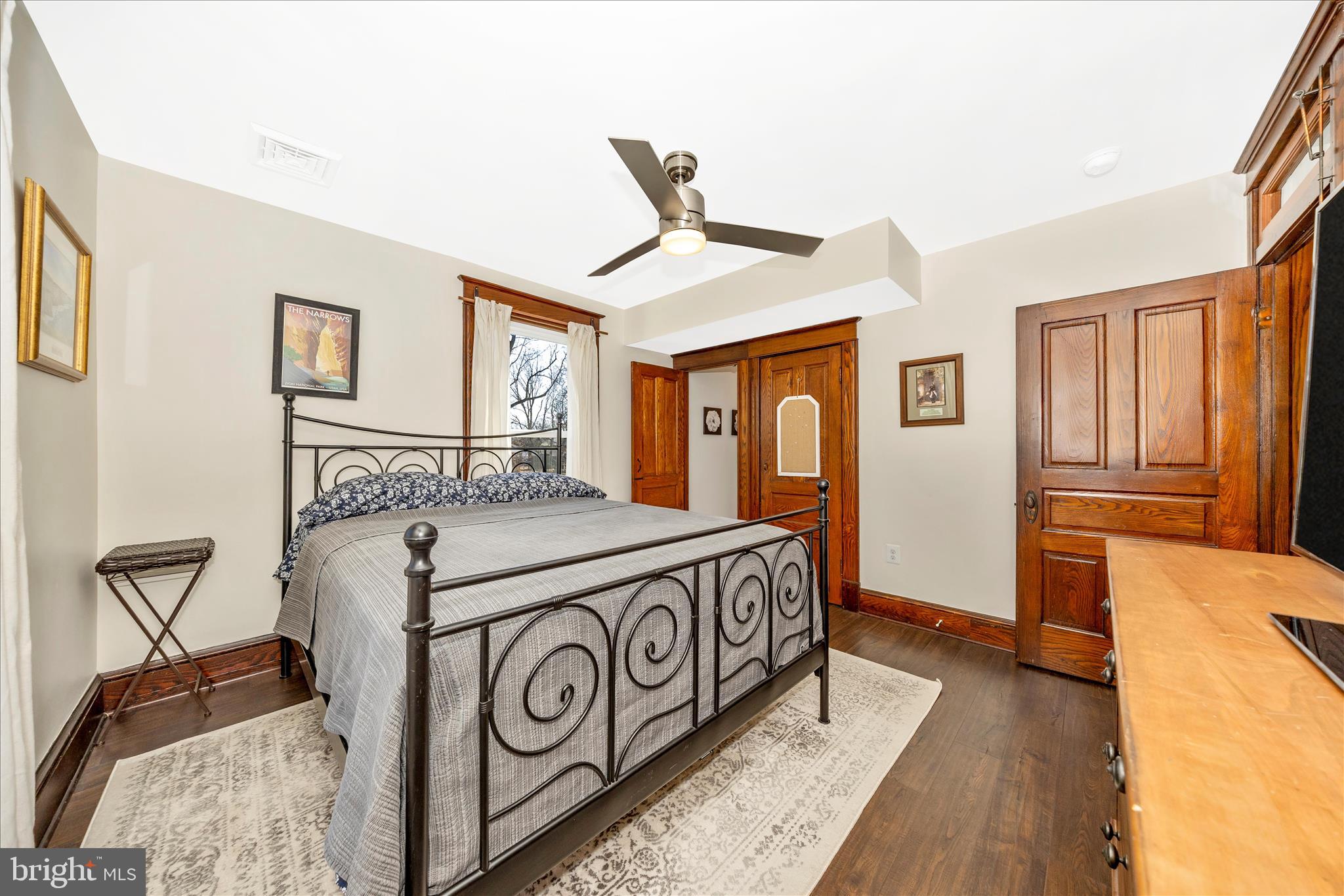 706 East Main Street Middletown, MD 21769 - Photo 24 of 63 a bedroom with a bed and wooden floor