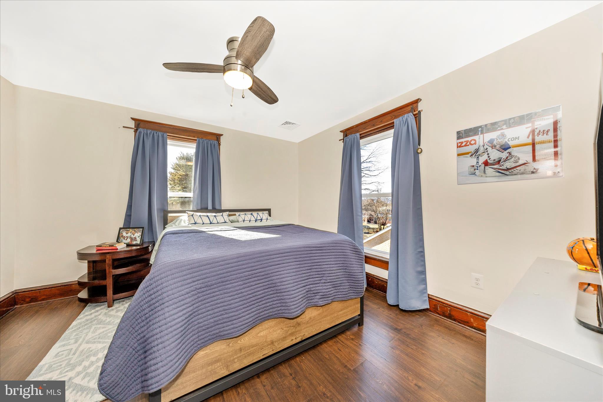 706 East Main Street Middletown, MD 21769 - Photo 26 of 63 a bedroom with a bed and a table
