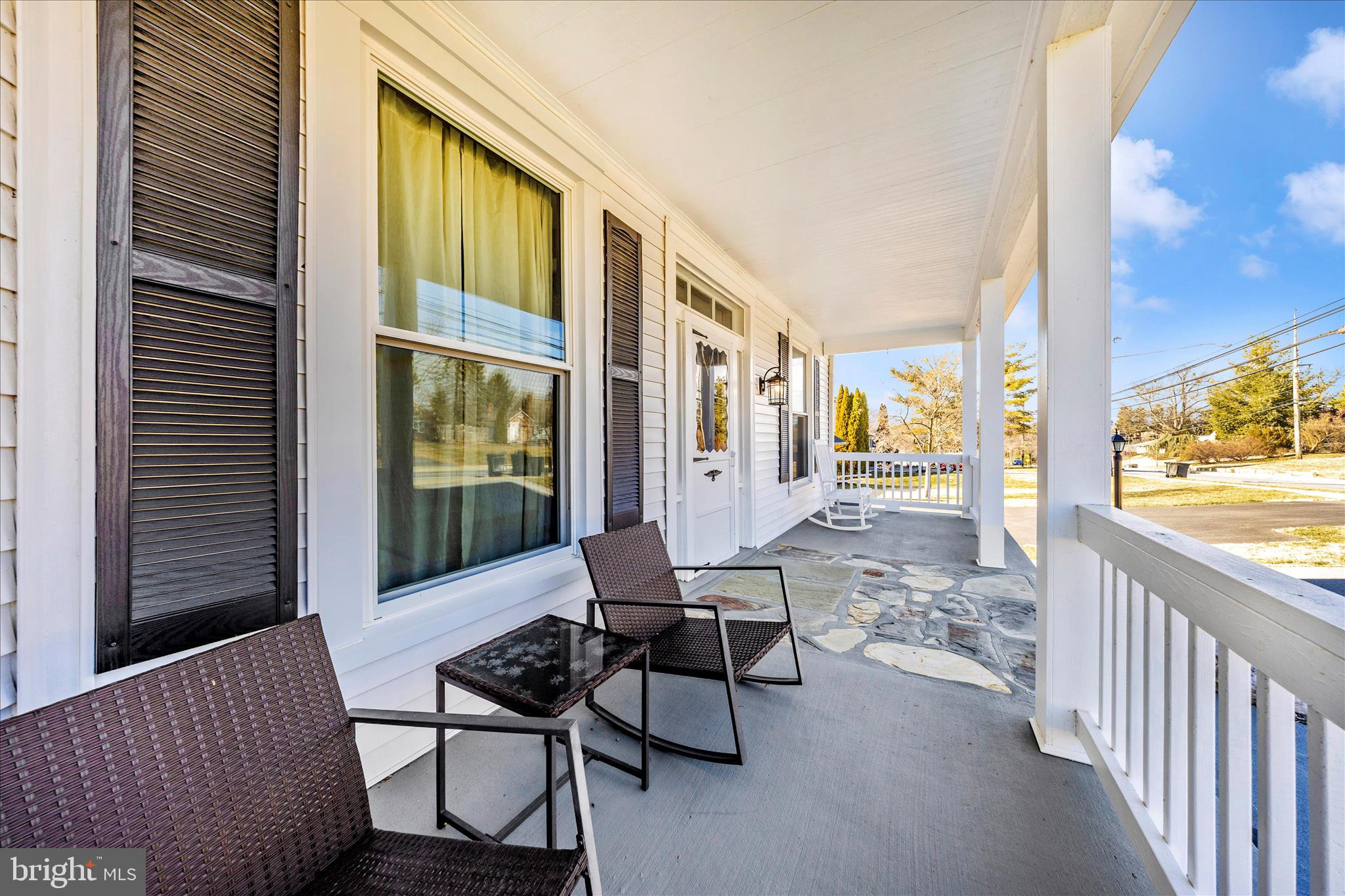 706 East Main Street Middletown, MD 21769 - Photo 40 of 63 a balcony with chairs and wooden floor