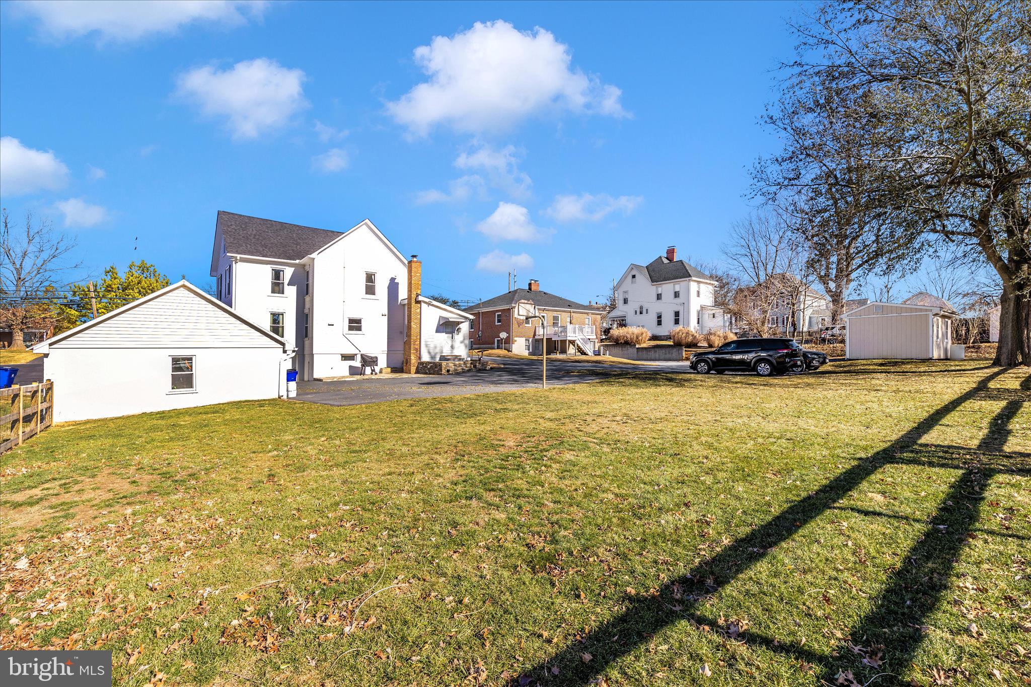 706 East Main Street Middletown, MD 21769 - Photo 42 of 63 a view of a houses with yard and swimming pool