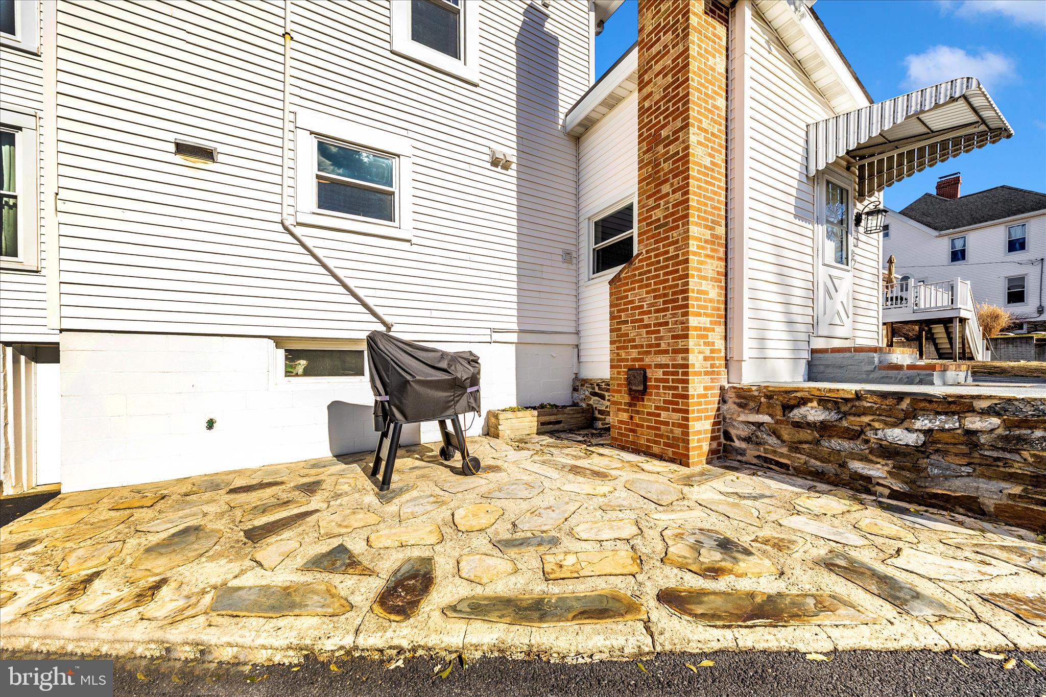 706 East Main Street Middletown, MD 21769 - Photo 46 of 63 a view of a lounge chairs in the back yard of the house