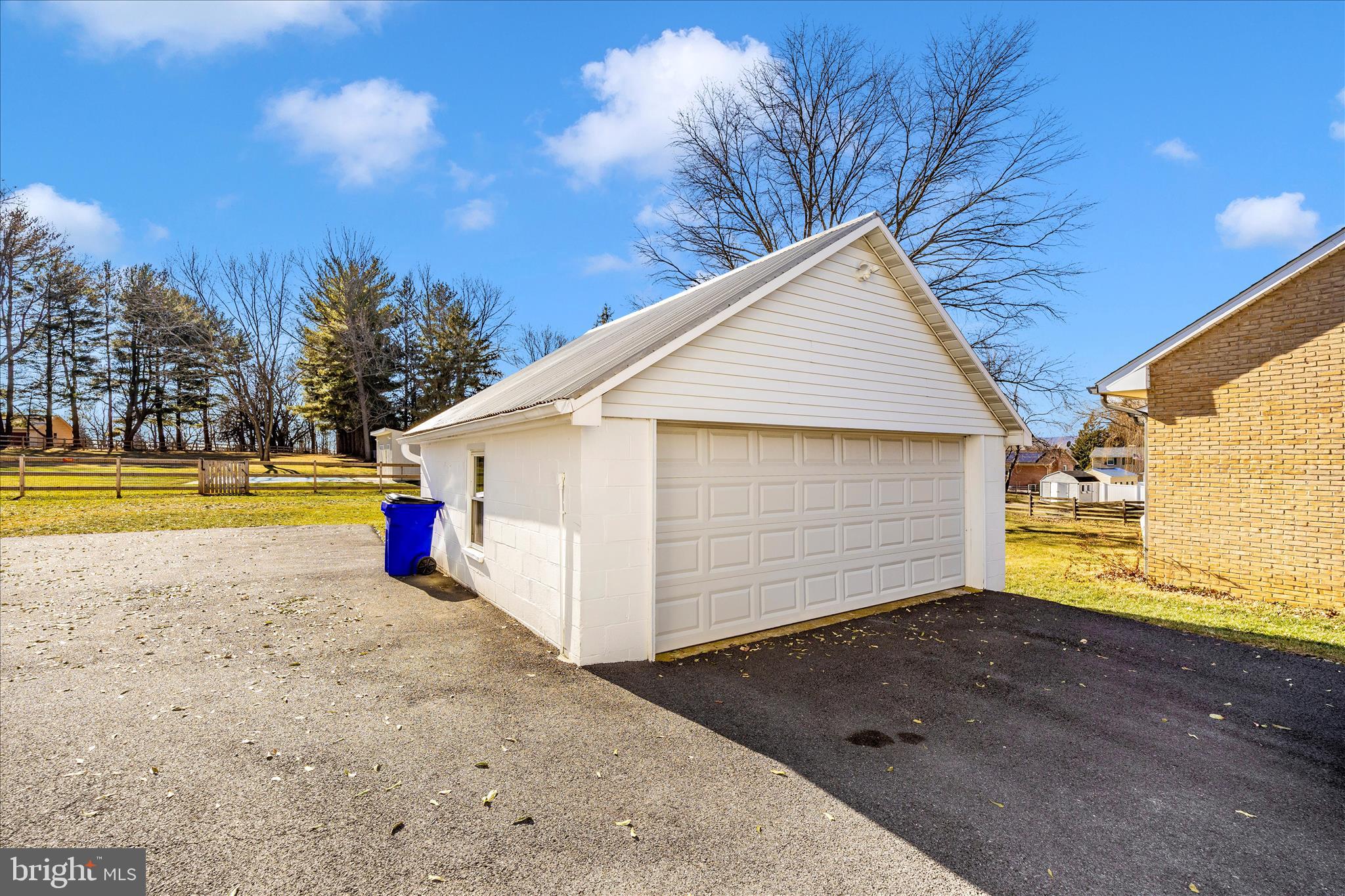 706 East Main Street Middletown, MD 21769 - Photo 47 of 63 a view of a house with a yard and a garage