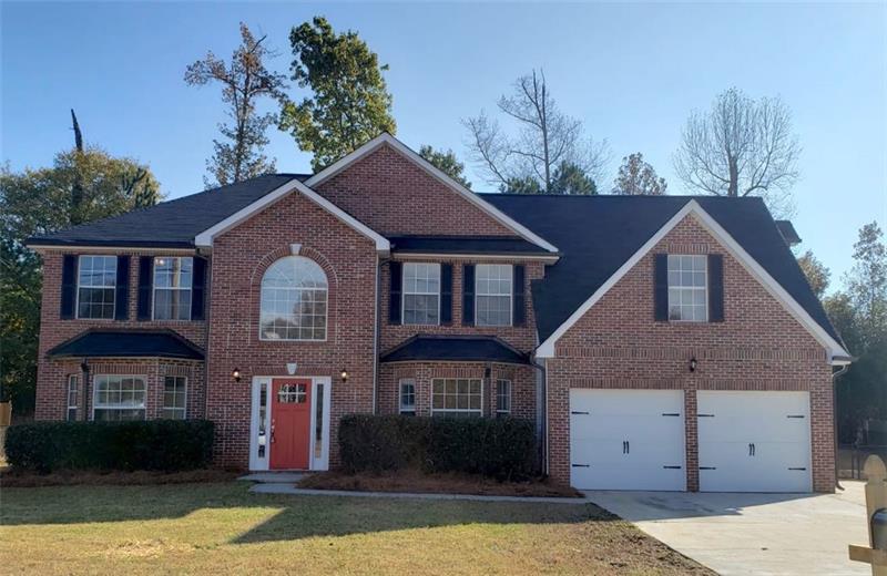2374 Marsh Rabbit Lane Decatur, GA 30035 - Photo 1 of 1 a front view of a house with a yard