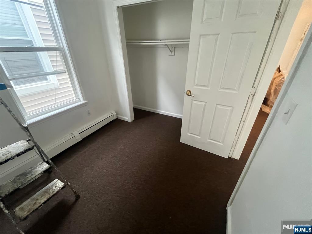 288 South 6th Street, Unit 2 Newark, NJ 07103 - Photo 2 of 5 a view of a room with an empty space and a window