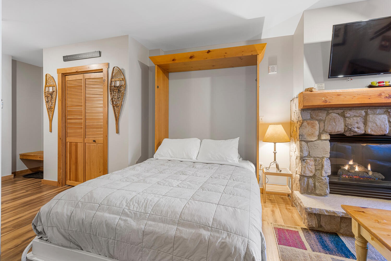 100 Dercum Square, Unit 8337 Keystone, CO 80435 - Photo 14 of 32 a bedroom with a bed and flat screen tv