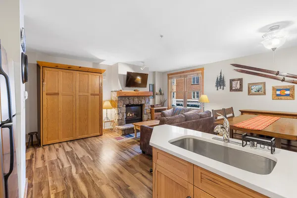 a kitchen with a refrigerator stove and microwave