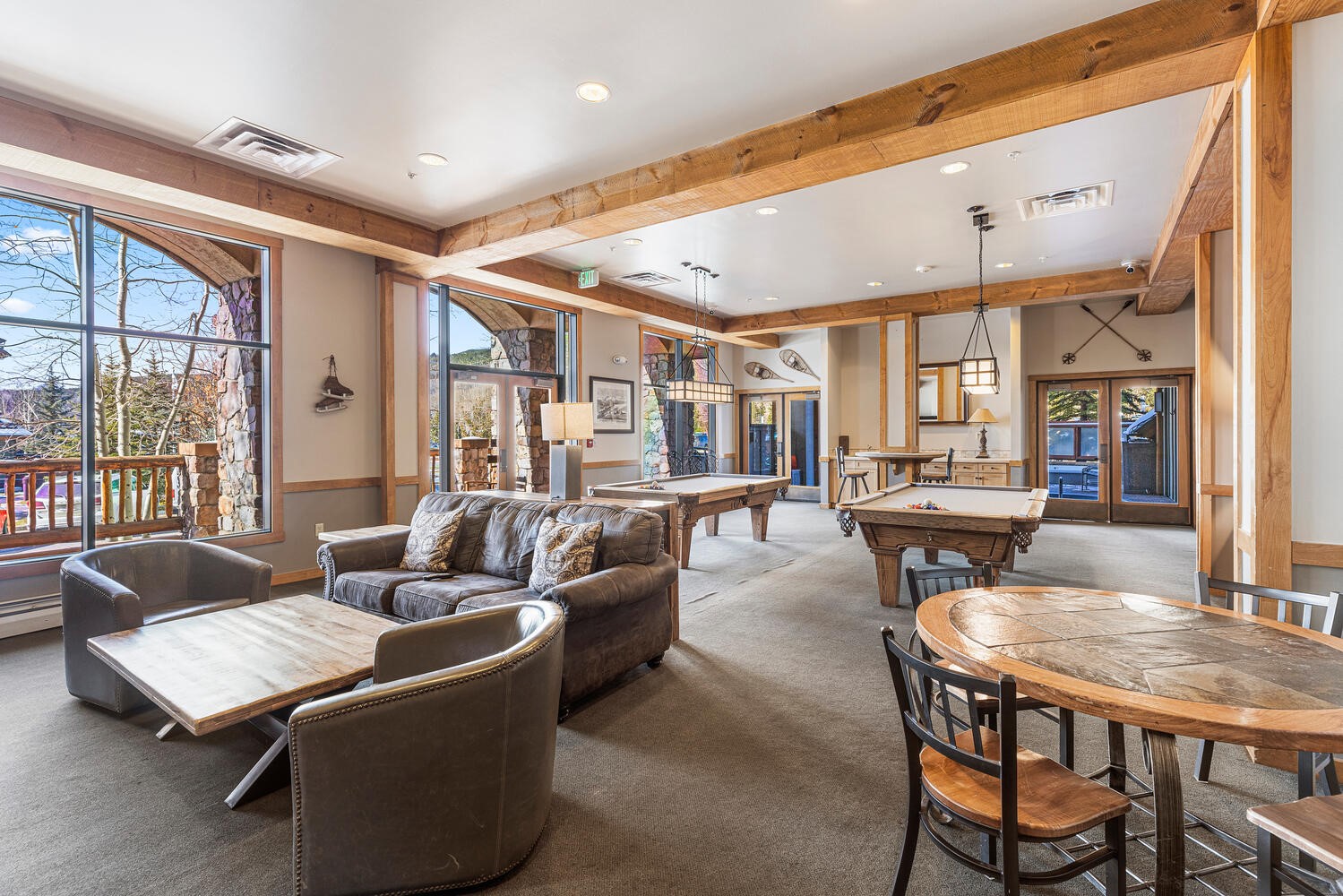 100 Dercum Square, Unit 8337 Keystone, CO 80435 - Photo 27 of 32 a living room with fireplace furniture and a large window