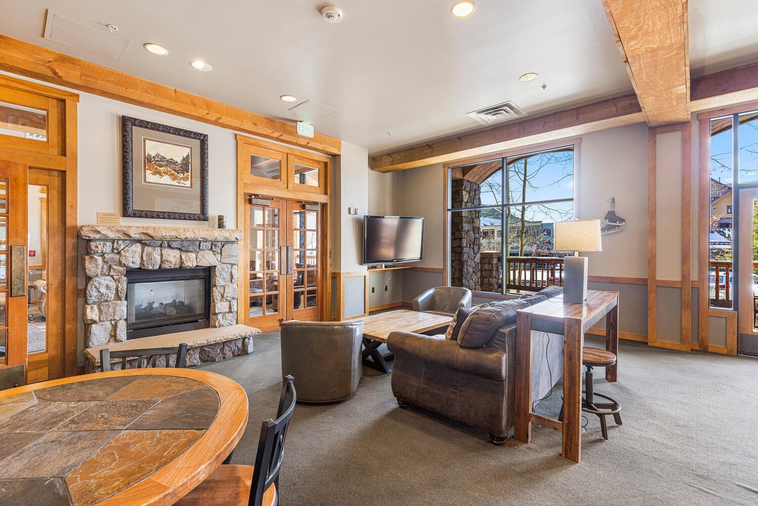 100 Dercum Square, Unit 8337 Keystone, CO 80435 - Photo 28 of 32 a living room with furniture a flat screen tv and a fireplace