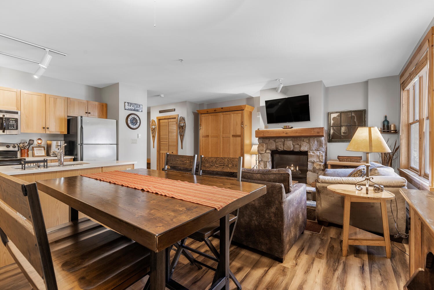 100 Dercum Square, Unit 8337 Keystone, CO 80435 - Photo 8 of 32 a view of a dining room with furniture window and wooden floor