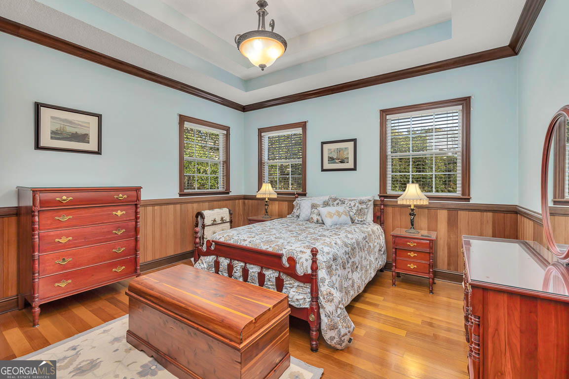 300 Elliott Road Waynesville, GA 31566 - Photo 59 of 89 a bedroom with a bed and a dresser