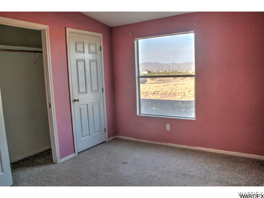 3969 Elfrida Road Golden Valley, AZ 86413 - Photo 15 of 29 a view of an empty room with a window