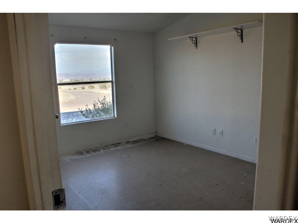 3969 Elfrida Road Golden Valley, AZ 86413 - Photo 16 of 29 a view of an empty room with a window