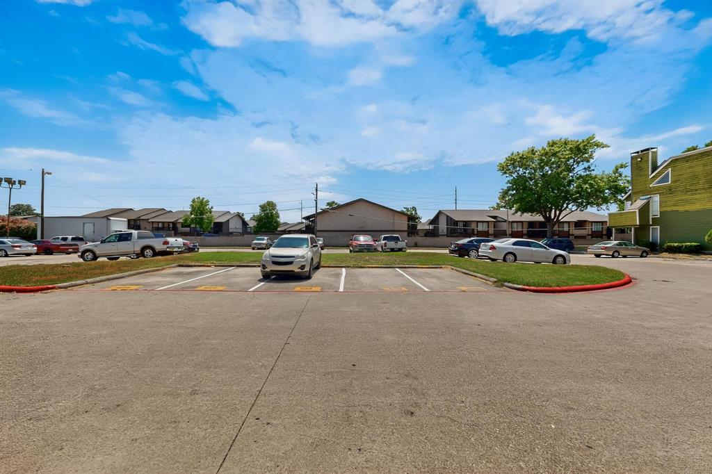 9809 Walnut Street, Unit E209 Dallas, TX 75243 - Photo 6 of 31 a view of the street