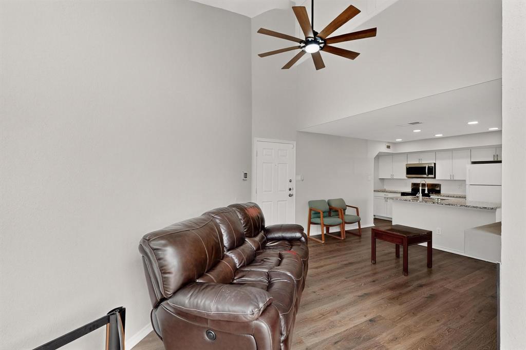 9809 Walnut Street, Unit E209 Dallas, TX 75243 - Photo 9 of 31 a living room with furniture