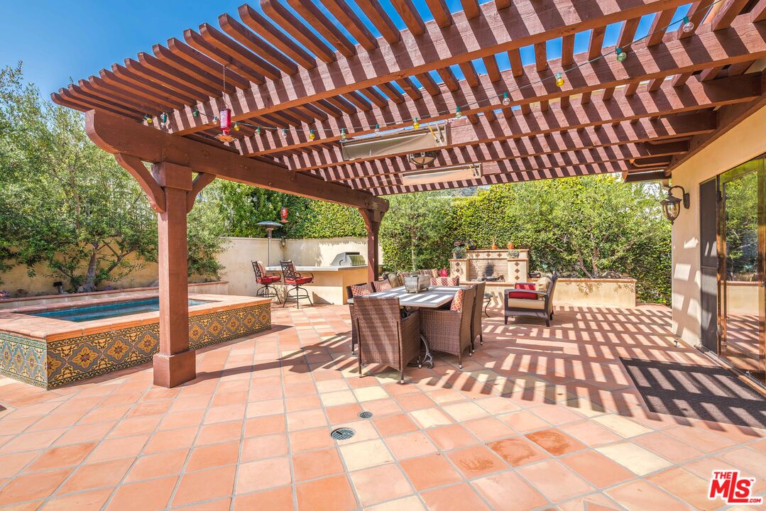 3643 Oceanhill Way Malibu, CA 90265 - Photo 24 of 28 a patio view with a seating space