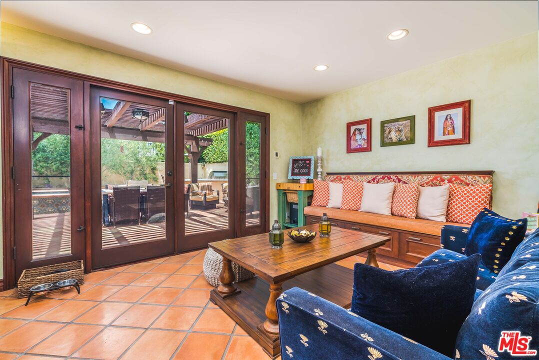 3643 Oceanhill Way Malibu, CA 90265 - Photo 9 of 28 a living room with furniture and large window