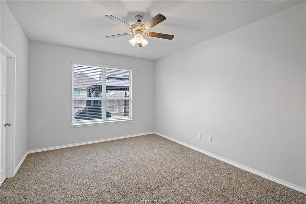 827 Mineral Wells Lane College Station, TX 77845 - Photo 17 of 23 an empty room with a window