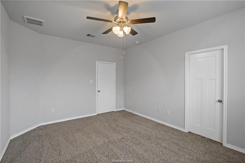 827 Mineral Wells Lane College Station, TX 77845 - Photo 18 of 23 a view of an empty room