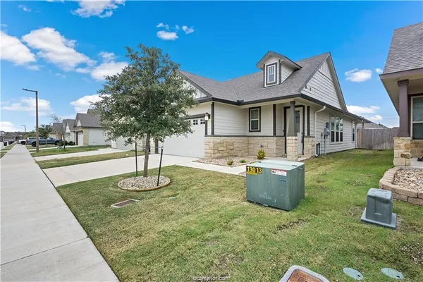 a front view of a house with entertaining space