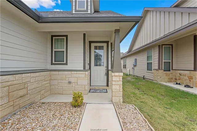 a view of a house with a porch