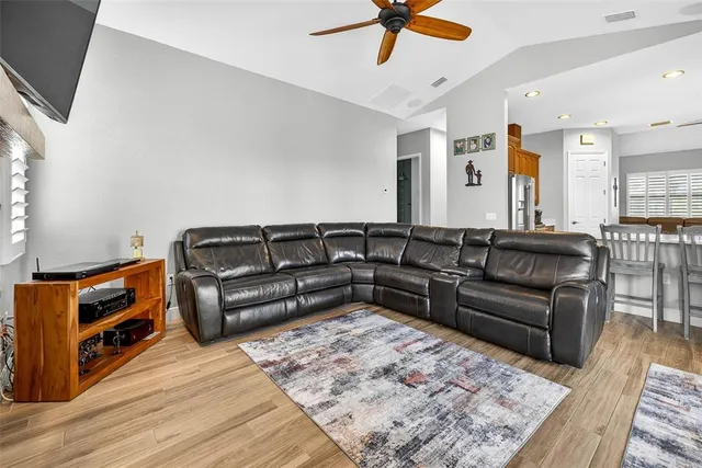 a bedroom with a bed dresser and a window