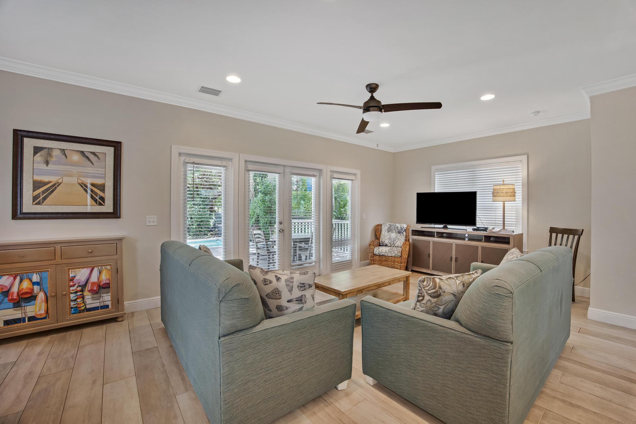 7204 Simran Lane Marathon, FL 33050 - Photo 13 of 47 a living room with furniture and a flat screen tv