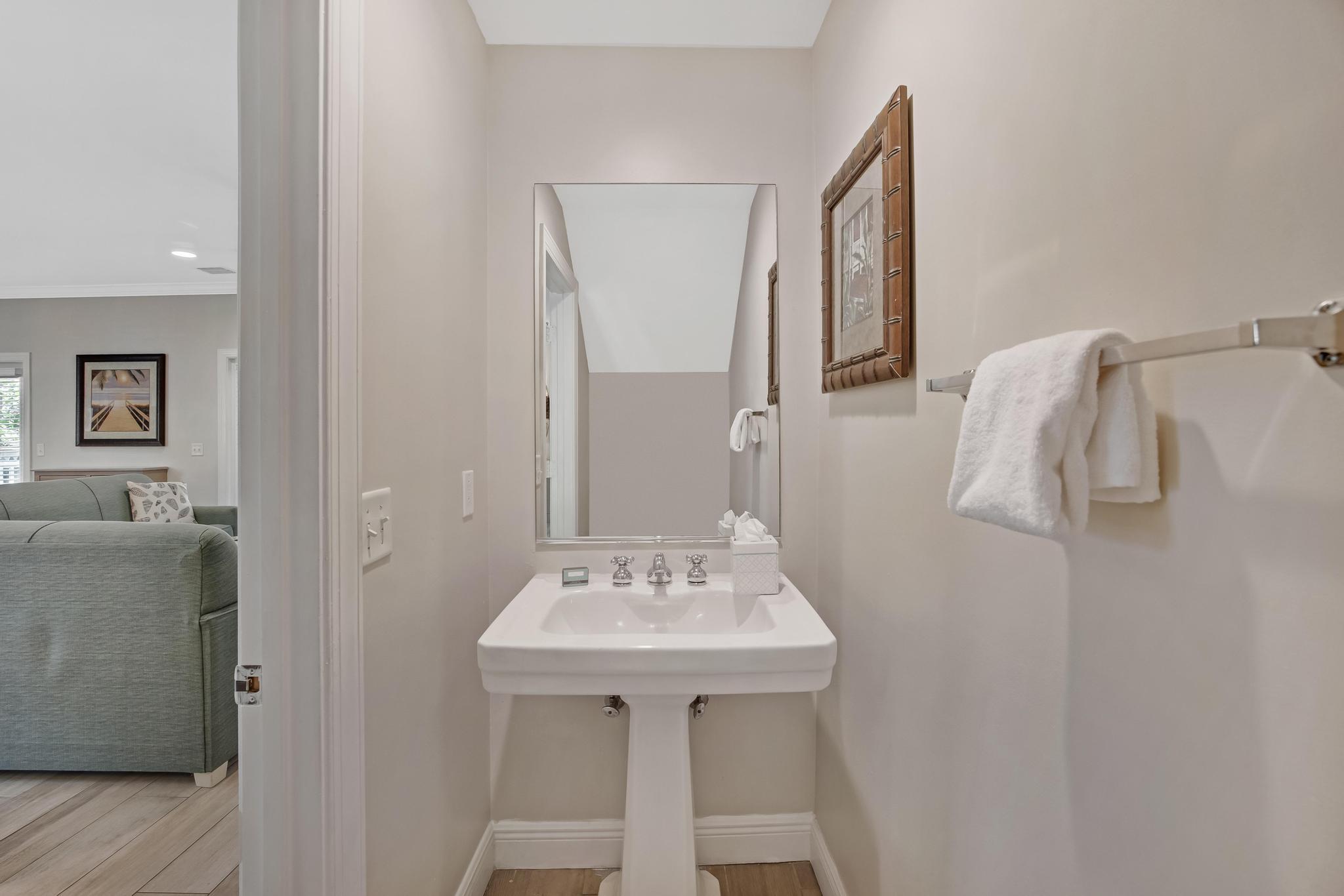 7204 Simran Lane Marathon, FL 33050 - Photo 14 of 47 a bathroom with a sink and mirror