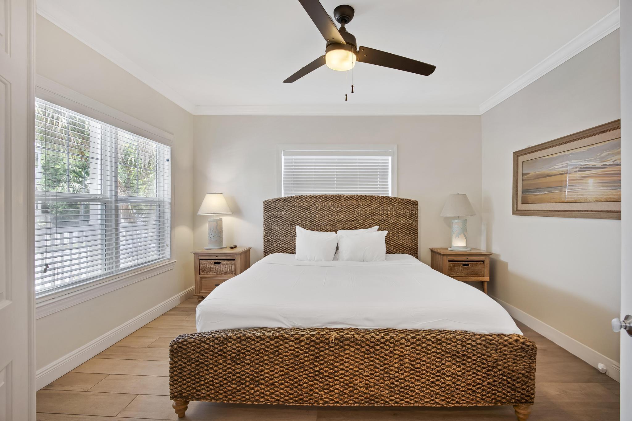 7204 Simran Lane Marathon, FL 33050 - Photo 16 of 47 a bedroom with a large bed and a window