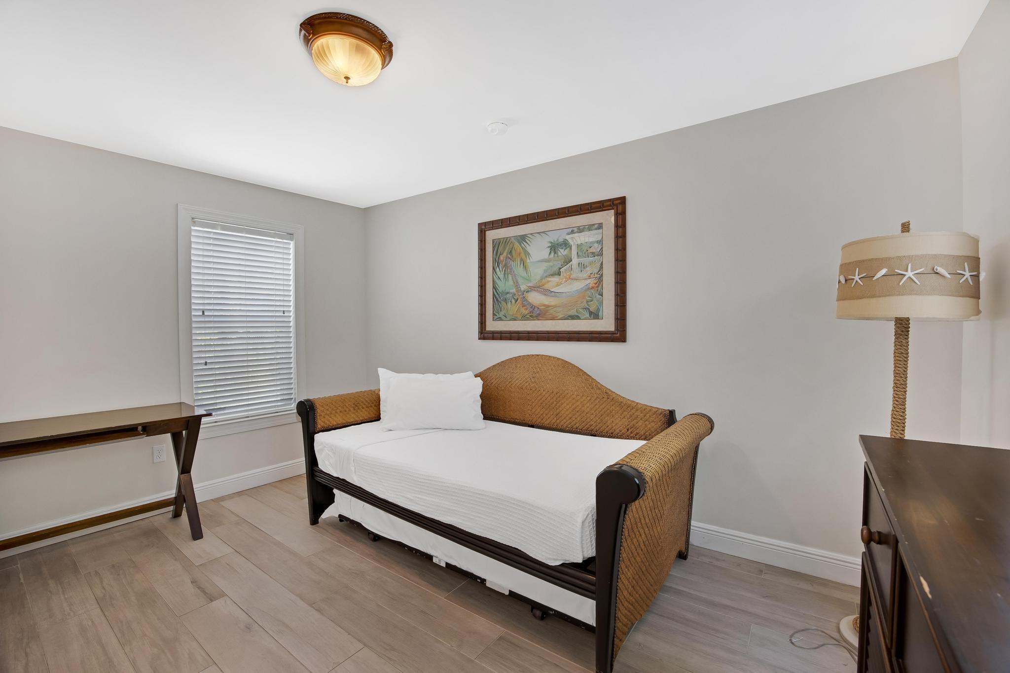 7204 Simran Lane Marathon, FL 33050 - Photo 25 of 47 a bedroom with bed and a window