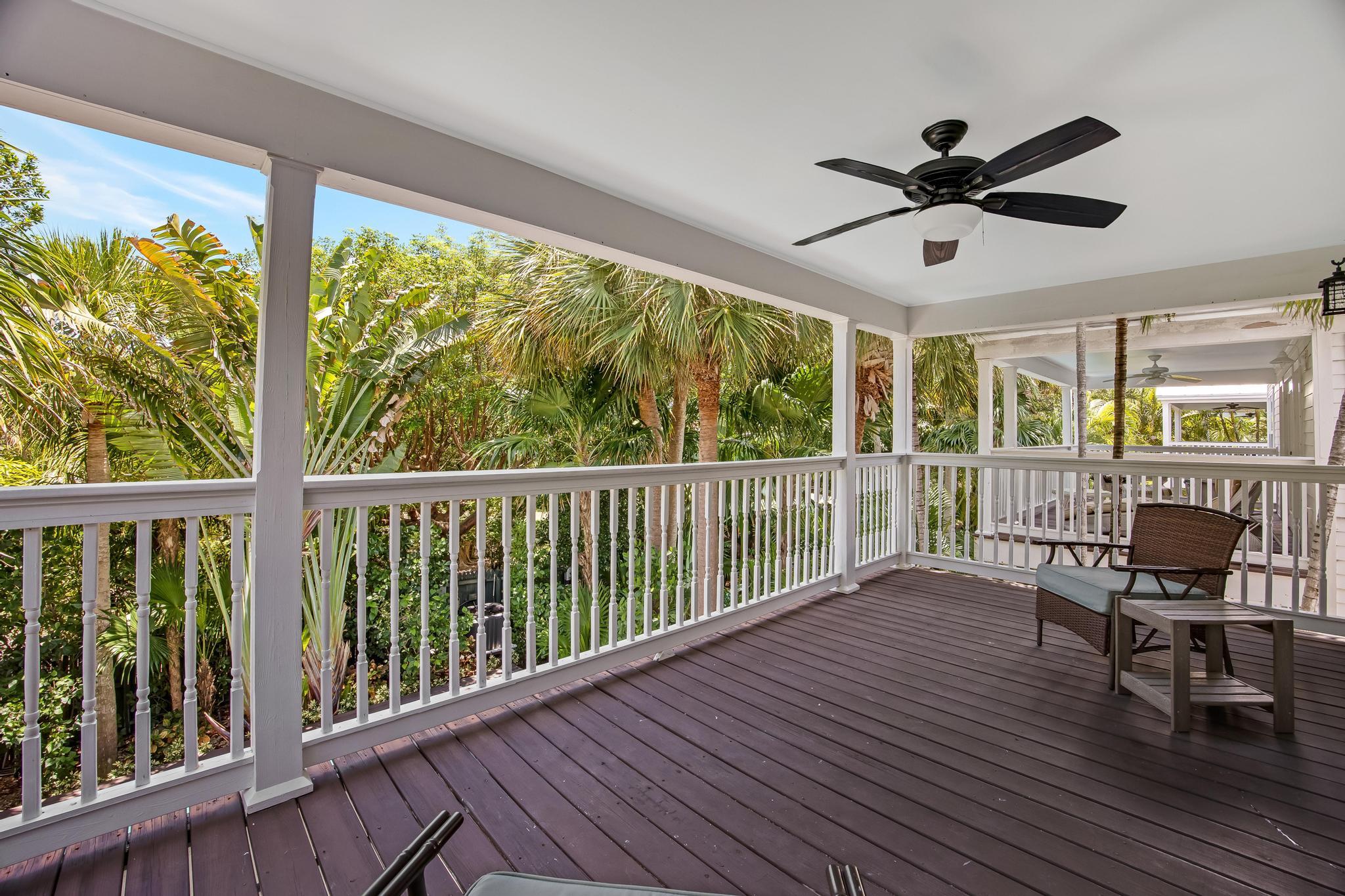7204 Simran Lane Marathon, FL 33050 - Photo 29 of 47 a view of a living room with furniture window and wooden floor