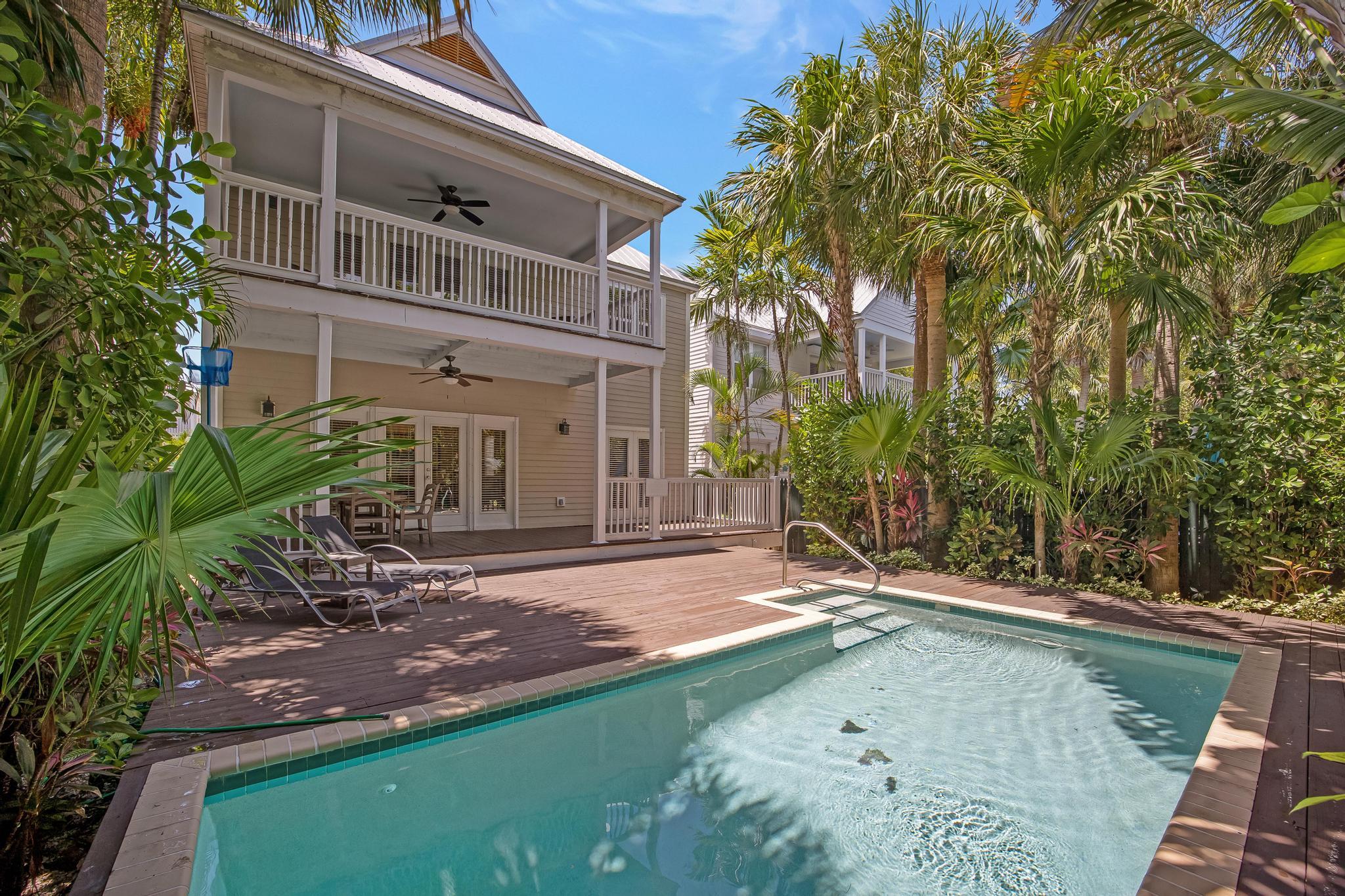 7204 Simran Lane Marathon, FL 33050 - Photo 44 of 47 a view of a house with backyard and sitting area
