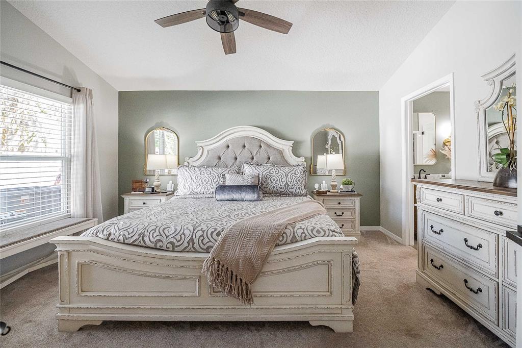 2524 Siena Way Valrico, FL 33596 - Photo 20 of 38 a bedroom with a bed and a dresser