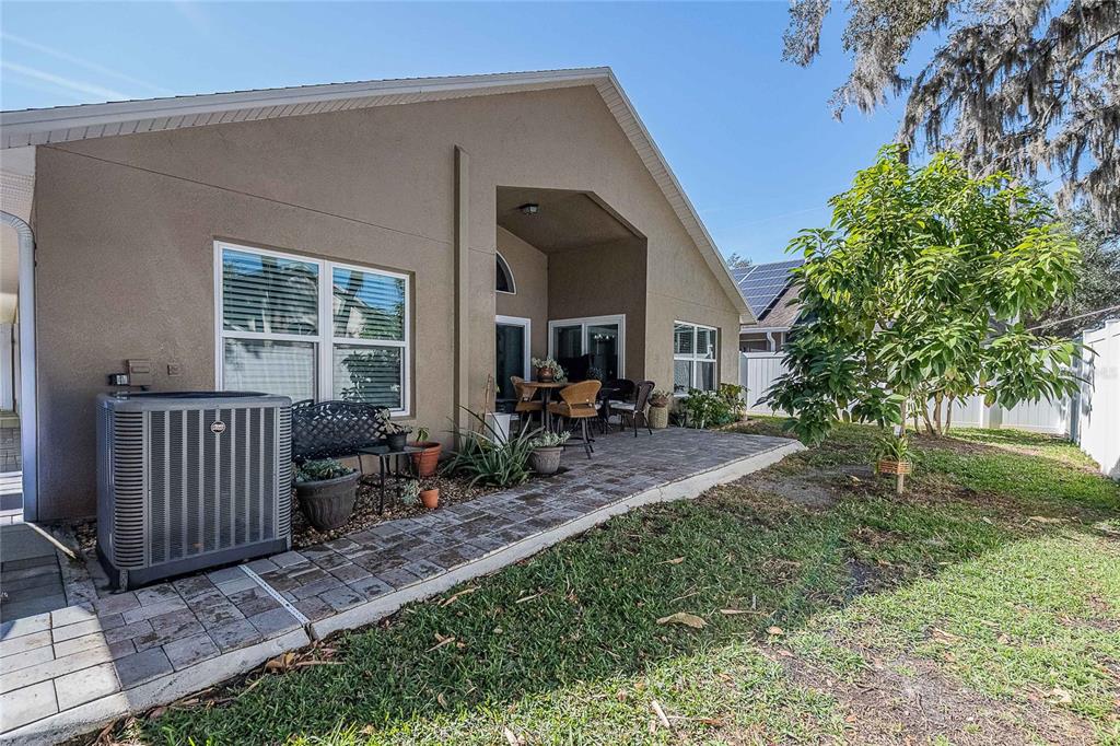 2524 Siena Way Valrico, FL 33596 - Photo 36 of 38 a view of backyard with deck and outdoor seating